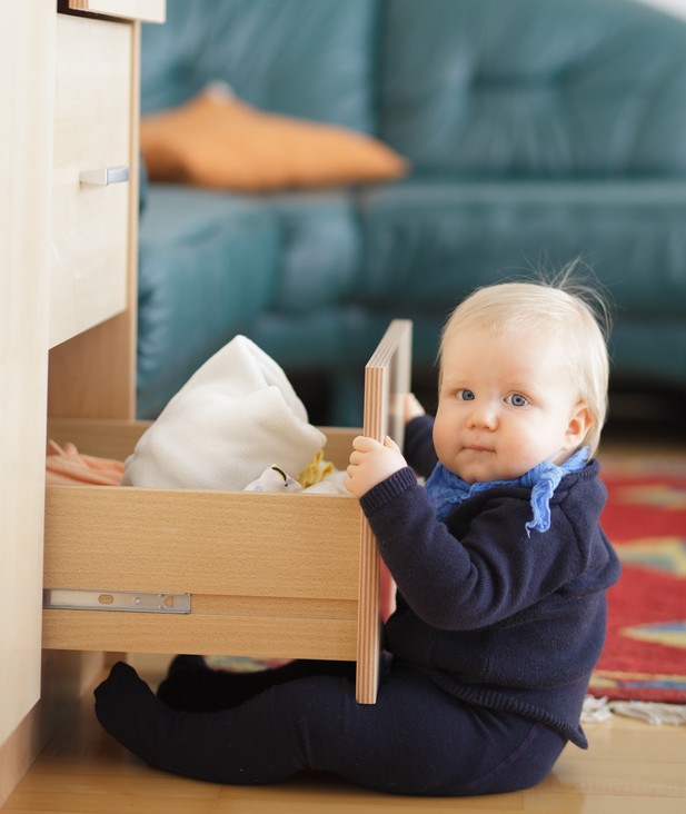 little-boy-opening-drawer-svb-wood-floors-kansas-city