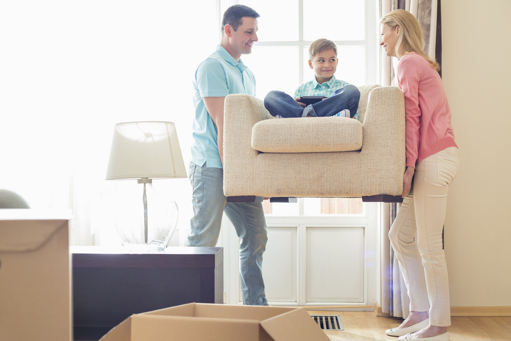 parents-moving-furniture-kid-in-chair-hardwood-floor-damage-svb-kansas-city