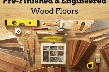 pre-finished vs engineered wood floors, with tools displayed on a wood surface