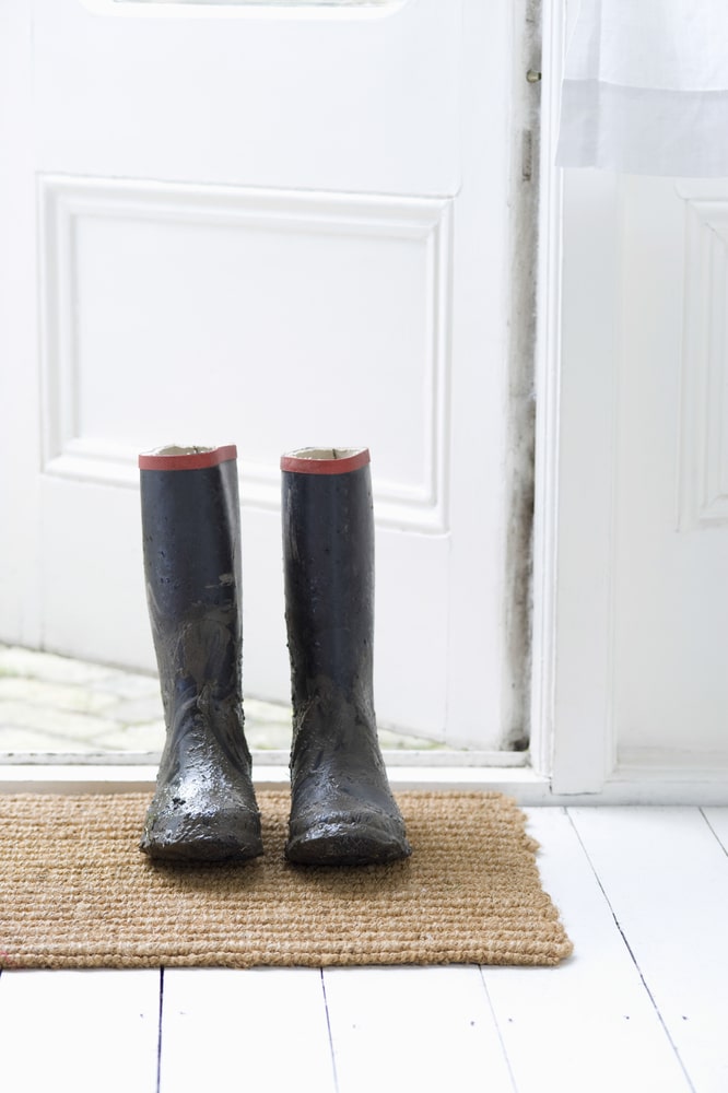 muddy-shoes-by-front-door