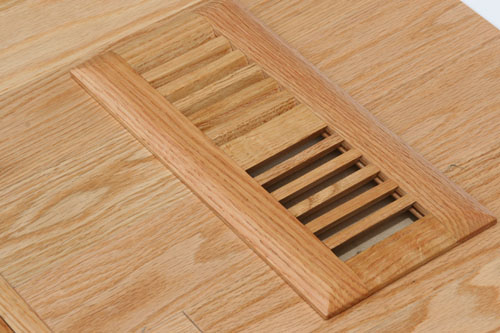 an example of a drop-in (or self-rimming) floor vent