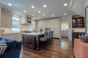 a kitchen with beautifully finished wood floor