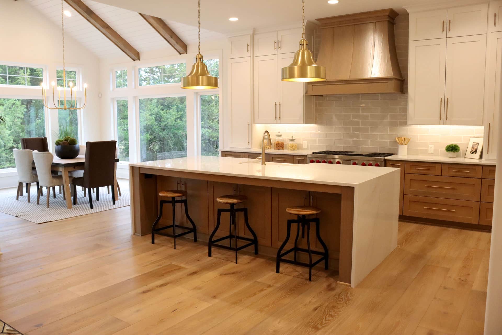 kitchen and dining room with refinished hardwood flooring