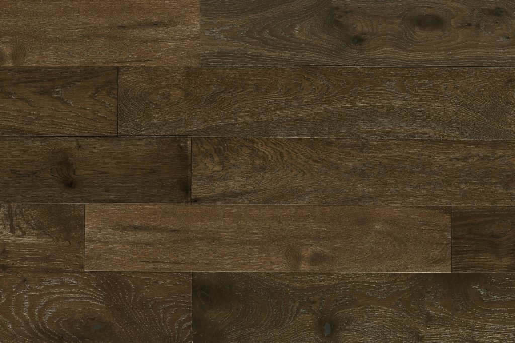 Timber Cove European Oak hardwood flooring swatch showcasing rich, warm tones and expressive grain patterns, emphasizing contemporary refinement and natural depth.