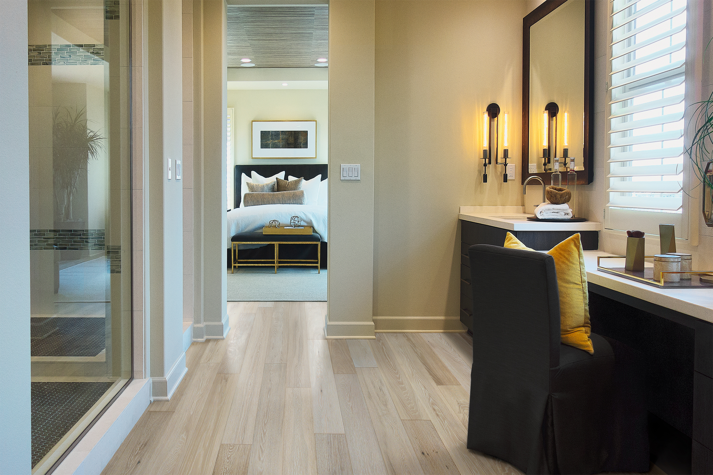 Elegant interior view showcasing Sea Salt European Oak flooring, with a stylish vanity area and a glimpse of a bedroom in the background.