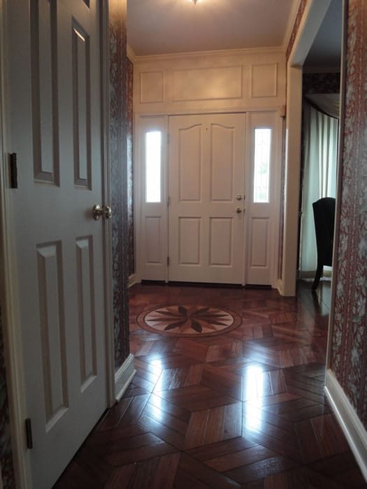white door and brown floor