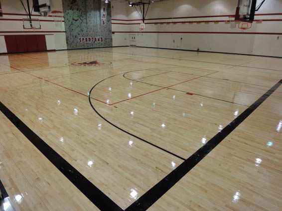 A picture of a hardwood gym floor system